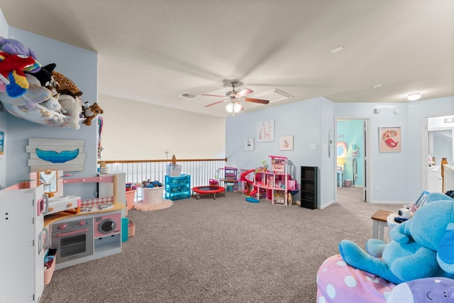 recreation room featuring carpet floors and ceiling fan