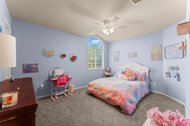 carpeted bedroom with vaulted ceiling, baseboards, and a ceiling fan