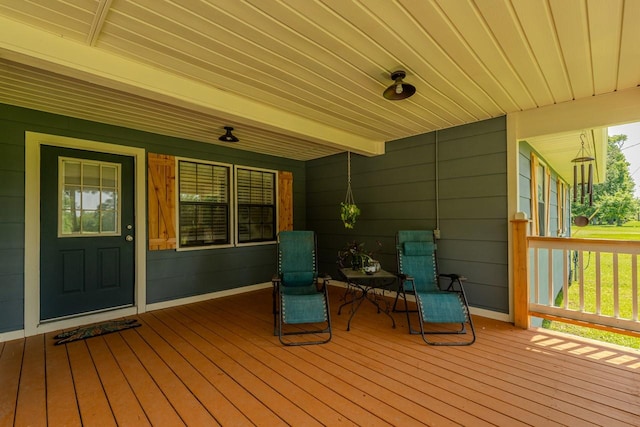 129 County Road 2063, Hull, TX 77564 - wooden terrace with covered porch