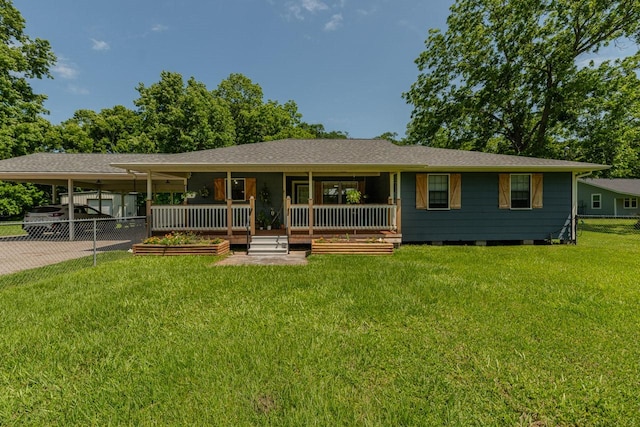 129 County Road 2063, Hull, TX 77564 - single story home featuring an attached carport, a front lawn, and driveway