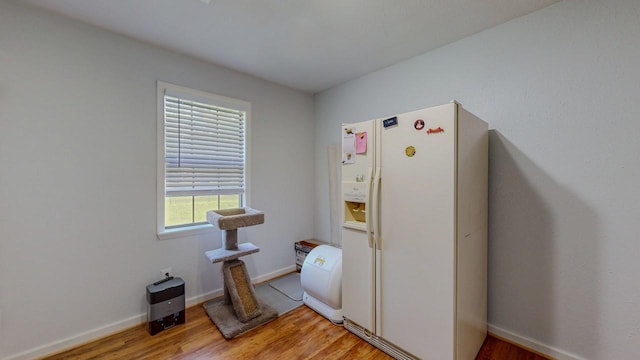 129 County Road 2063, Hull, TX 77564 - miscellaneous room with light wood finished floors and baseboards