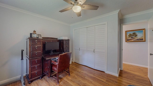 129 County Road 2063, Hull, TX 77564 - office with wood finished floors, ceiling fan, baseboards, ornamental molding, and a textured ceiling