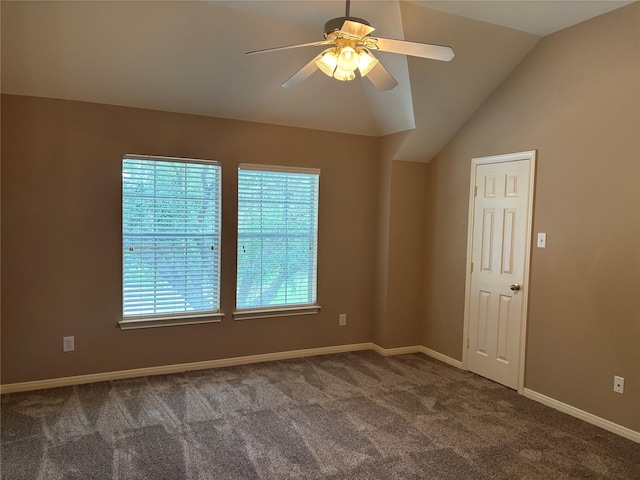 unfurnished room with ceiling fan, carpet flooring, lofted ceiling, and baseboards