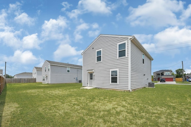 1325 Rd 5102, Cleveland, TX 77327 - rear view of house featuring central AC unit
