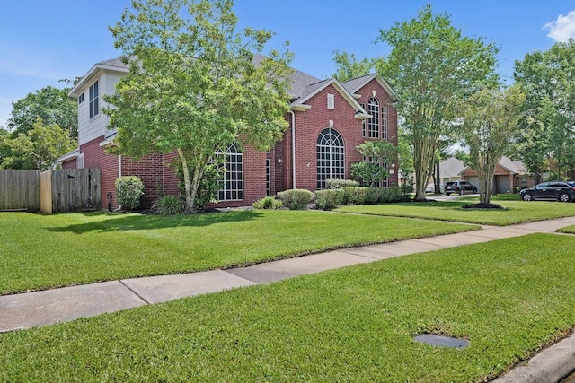 view of front of property featuring brick siding