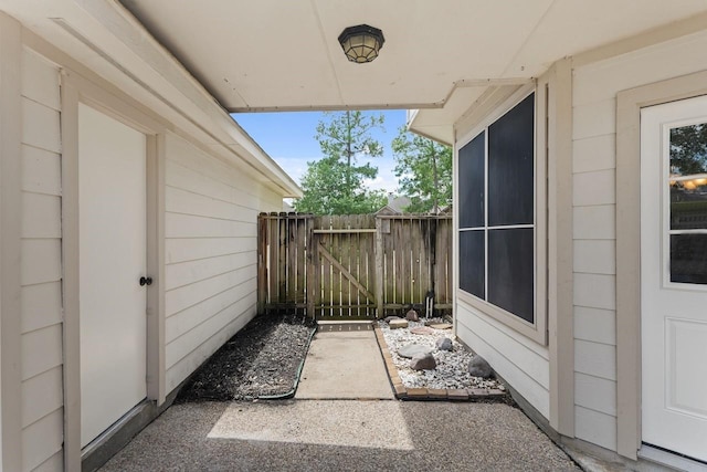 view of patio / terrace with a gate and fence