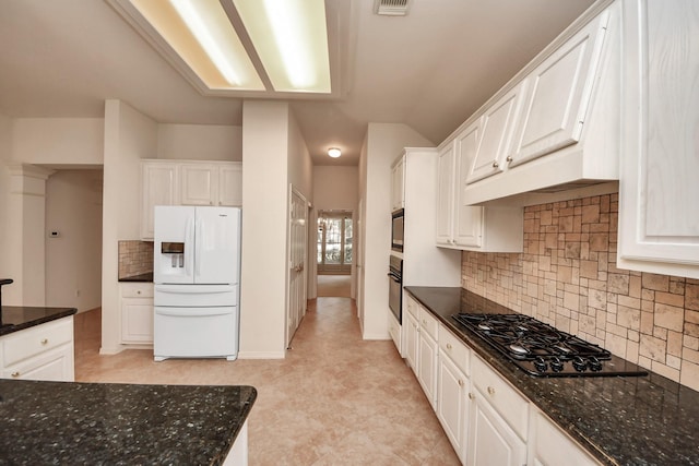 1119 Summer Brk, Sugar Land, TX 77479 - kitchen with black appliances, tasteful backsplash, white cabinets, and dark stone countertops