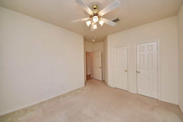 1119 Summer Brk, Sugar Land, TX 77479 - unfurnished bedroom featuring light carpet, baseboards, and a ceiling fan