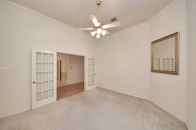 1119 Summer Brk, Sugar Land, TX 77479 - spare room featuring french doors, light colored carpet, ornamental molding, and ceiling fan