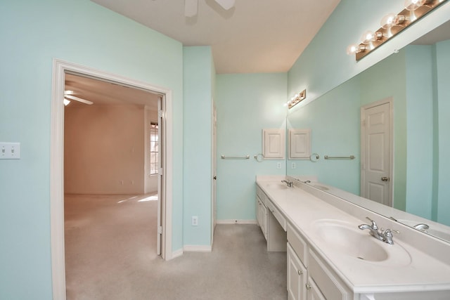 1119 Summer Brk, Sugar Land, TX 77479 - bathroom featuring a ceiling fan, double vanity, and baseboards