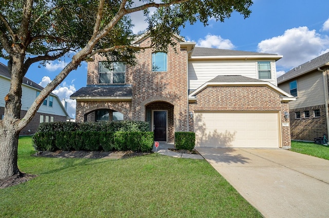 traditional home with brick siding, driveway, and a front lawn