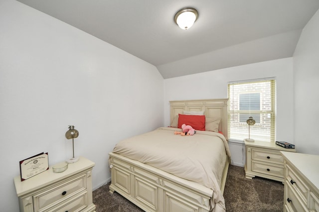 7215 Cypress Pin Oak Dr, Cypress, TX 77433 - bedroom with dark colored carpet, lofted ceiling, and baseboards