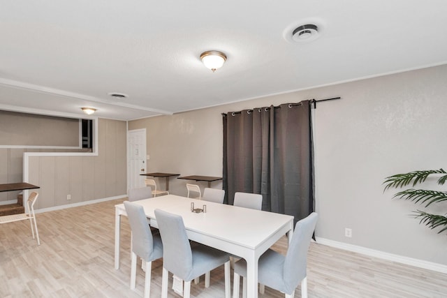 602 Bluebonnet Dr, La Marque, TX 77568 - dining room featuring light wood finished floors and baseboards