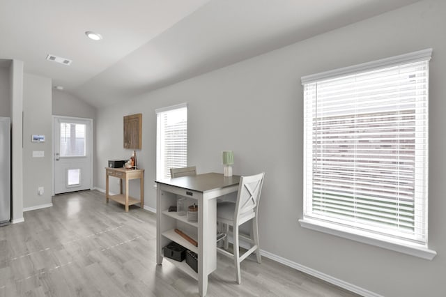 8230 Red Spruce St, Magnolia, TX 77354 - dining room with baseboards, vaulted ceiling, and light wood finished floors