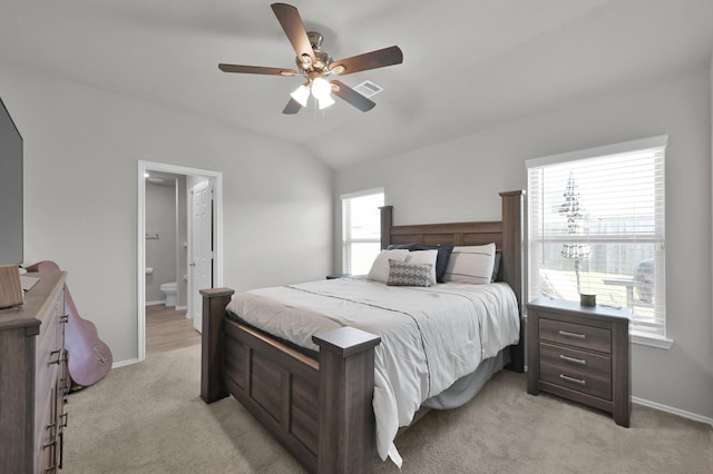 8230 Red Spruce St, Magnolia, TX 77354 - bedroom with light colored carpet, lofted ceiling, baseboards, connected bathroom, and a ceiling fan