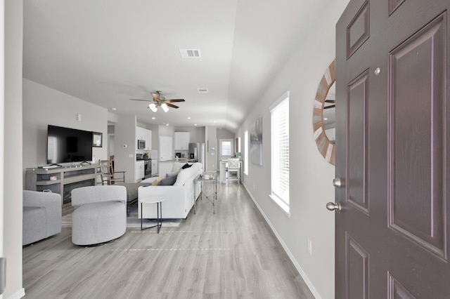 8230 Red Spruce St, Magnolia, TX 77354 - living area featuring light wood finished floors, a ceiling fan, baseboards, and recessed lighting