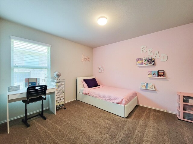 4931 Marina Shores Ct, Katy, TX 77493 - carpeted bedroom featuring a desk