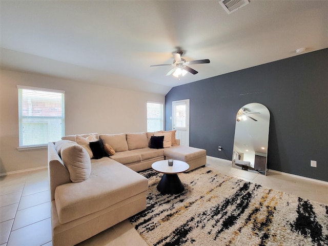 4931 Marina Shores Ct, Katy, TX 77493 - living room with light tile patterned flooring, ceiling fan, healthy amount of natural light, and baseboards
