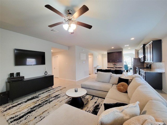 4931 Marina Shores Ct, Katy, TX 77493 - living room featuring a ceiling fan, baseboards, and recessed lighting