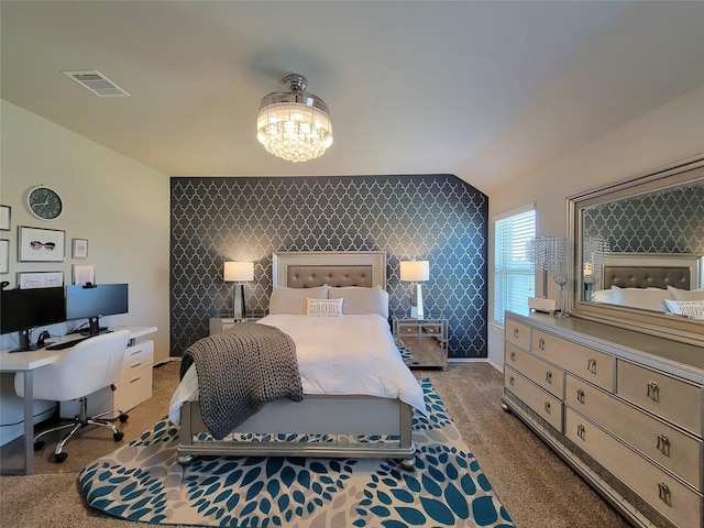 4931 Marina Shores Ct, Katy, TX 77493 - bedroom with an accent wall, carpet flooring, a chandelier, lofted ceiling, and a desk
