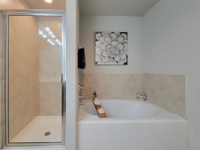 4931 Marina Shores Ct, Katy, TX 77493 - bathroom with a shower stall and a garden tub