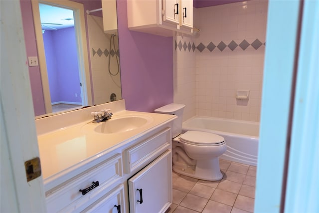 full bathroom featuring tile patterned flooring, toilet, vanity, and tub / shower combination