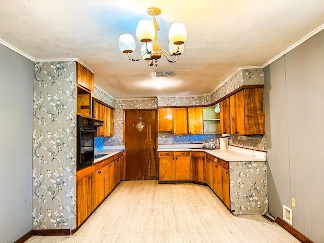 1085 Duke Rd, Kennard, TX 75847 - kitchen with open shelves, brown cabinets, a chandelier, light wood-type flooring, and oven
