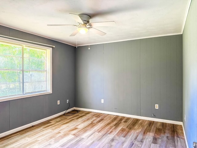 1085 Duke Rd, Kennard, TX 75847 - empty room featuring wood finished floors, ceiling fan, baseboards, and ornamental molding