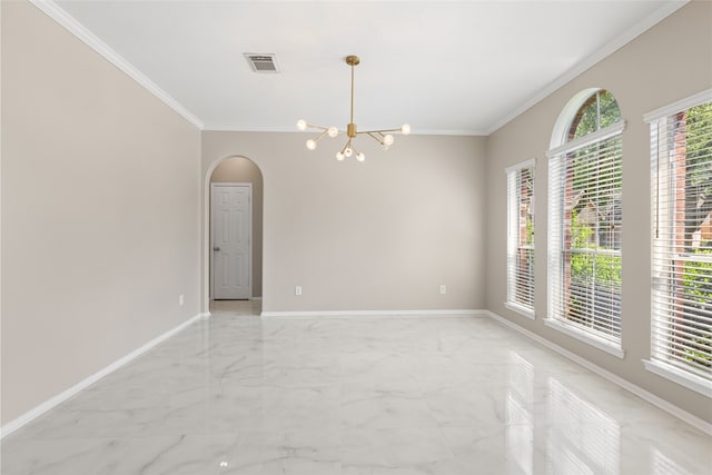 20106 Pinehaven Ln, Spring, TX 77379 - spare room with ornamental molding, light marble finish floors, a chandelier, baseboards, and arched walkways