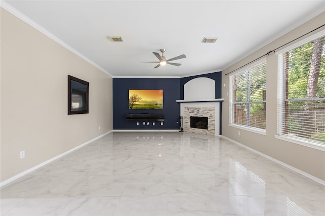 20106 Pinehaven Ln, Spring, TX 77379 - unfurnished living room with marble tiled floors, baseboards, ceiling fan, crown molding, and a fireplace