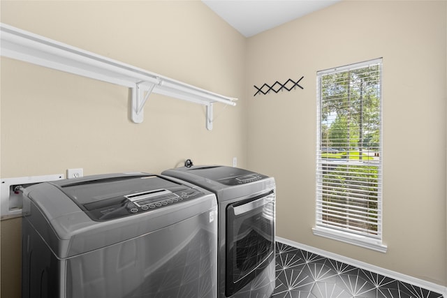 20106 Pinehaven Ln, Spring, TX 77379 - laundry area featuring washer and dryer and baseboards