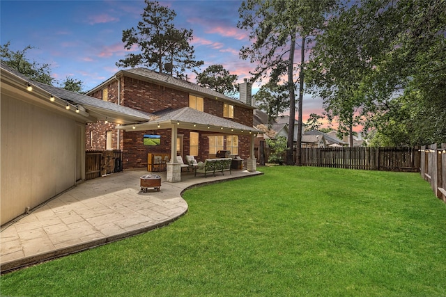 20106 Pinehaven Ln, Spring, TX 77379 - yard at dusk with a patio