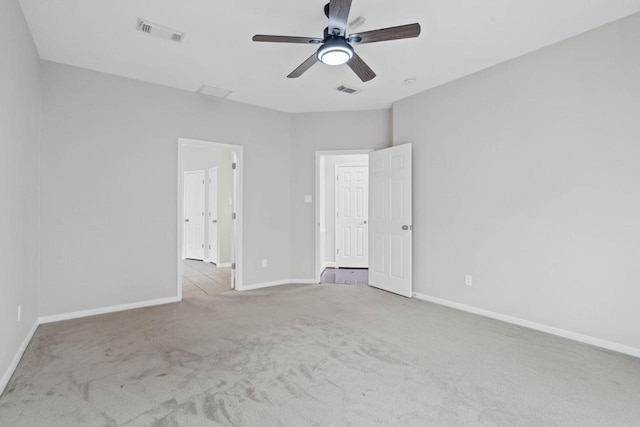 12506 Emerald Springs Dr, Pearland, TX 77584 - spare room with carpet floors, a ceiling fan, and baseboards
