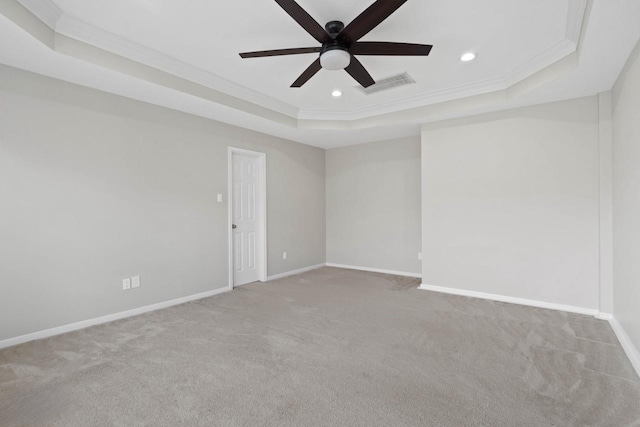 12506 Emerald Springs Dr, Pearland, TX 77584 - carpeted spare room with a tray ceiling, ceiling fan, recessed lighting, ornamental molding, and baseboards