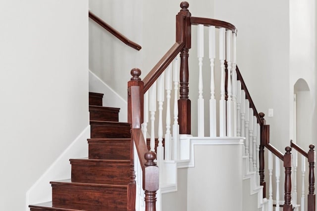 12506 Emerald Springs Dr, Pearland, TX 77584 - stairs featuring arched walkways
