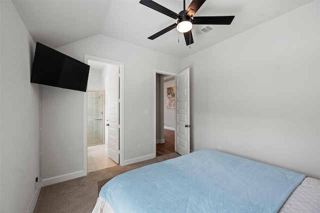 19322 Stagecoach Breeze Ln, Tomball, TX 77377 - bedroom featuring light carpet, baseboards, connected bathroom, ceiling fan, and lofted ceiling