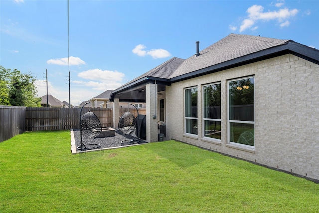19322 Stagecoach Breeze Ln, Tomball, TX 77377 - rear view of property featuring roof with shingles, a patio, and brick siding