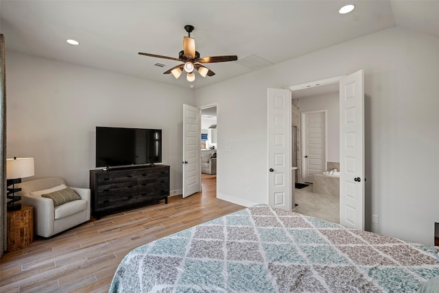 19322 Stagecoach Breeze Ln, Tomball, TX 77377 - bedroom with light wood finished floors, recessed lighting, a ceiling fan, and baseboards