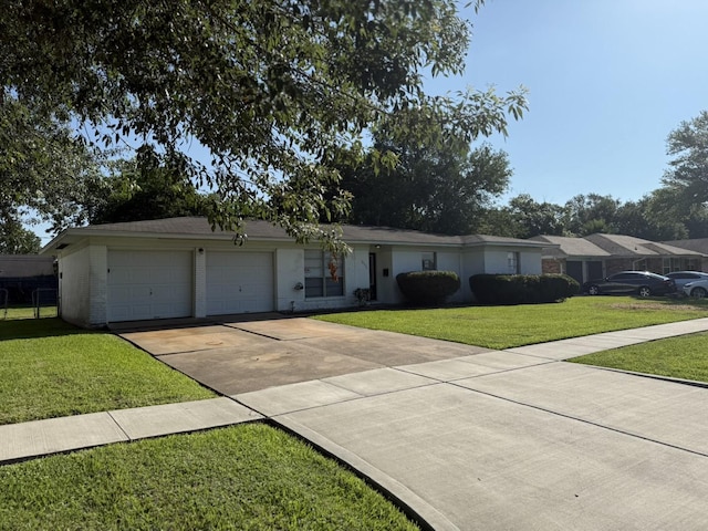 10331 Collingswood Rd, La Porte, TX 77571 - ranch-style house featuring a garage, a front lawn, and concrete driveway