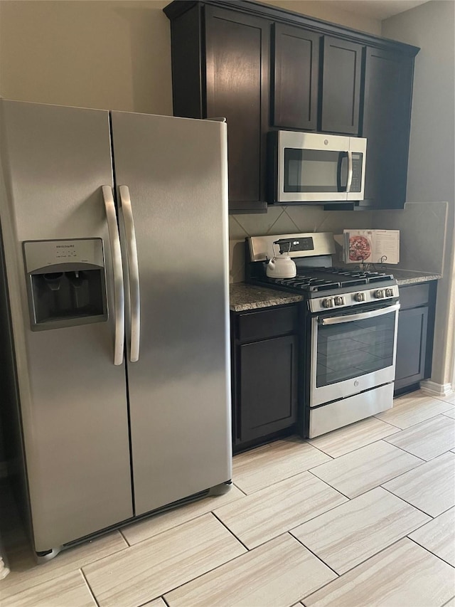 3230 Harmony Creek Ln, Spring, TX 77386 - kitchen featuring appliances with stainless steel finishes and wood finish floors