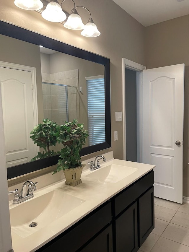3230 Harmony Creek Ln, Spring, TX 77386 - bathroom with a shower stall, double vanity, and tile patterned flooring