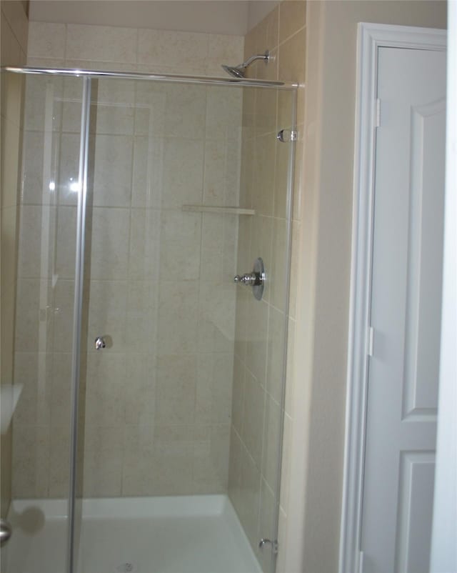 3230 Harmony Creek Ln, Spring, TX 77386 - bathroom with a stall shower