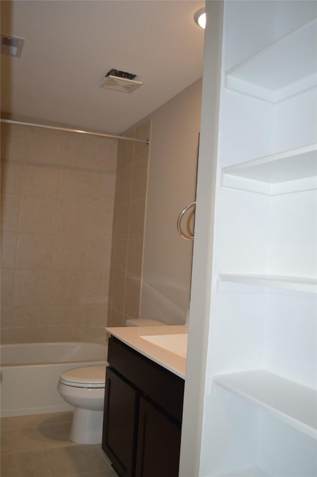 3230 Harmony Creek Ln, Spring, TX 77386 - full bath featuring vanity, toilet, tile patterned floors, and bathing tub / shower combination