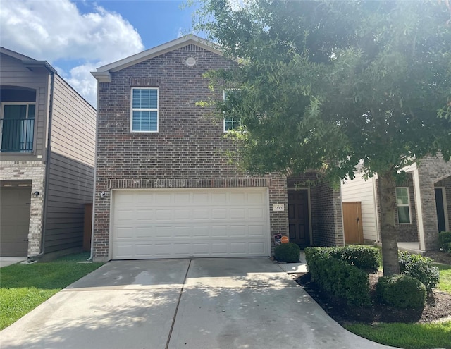 3230 Harmony Creek Ln, Spring, TX 77386 - traditional-style home featuring brick siding, driveway, and a garage