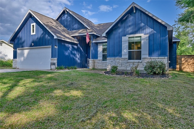 26495 Pin Oak Dr, Hempstead, TX 77445 - view of front of home featuring board and batten siding, stone siding, and a front yard