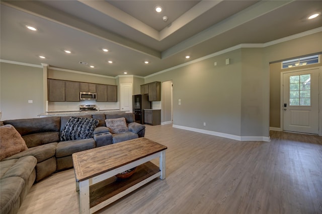 26495 Pin Oak Dr, Hempstead, TX 77445 - living room featuring light wood-type flooring, baseboards, recessed lighting, and crown molding