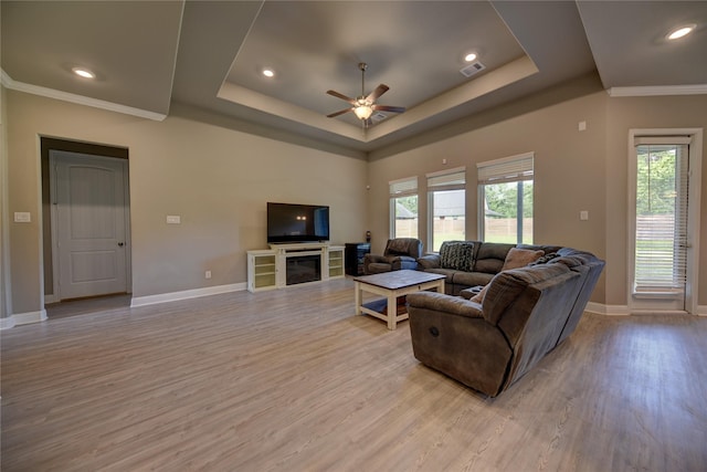 26495 Pin Oak Dr, Hempstead, TX 77445 - living area with light wood-type flooring, baseboards, a raised ceiling, ceiling fan, and recessed lighting