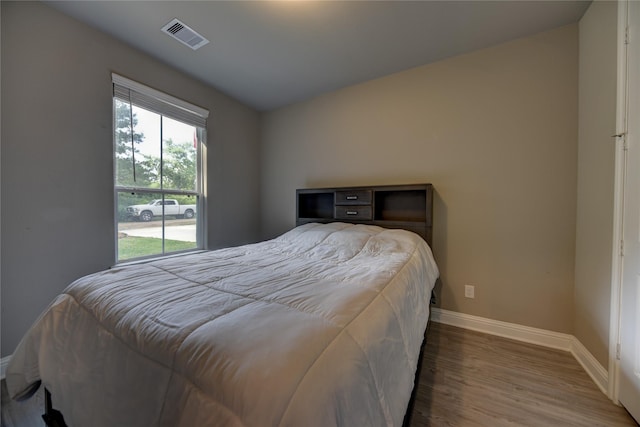26495 Pin Oak Dr, Hempstead, TX 77445 - bedroom with baseboards and wood finished floors