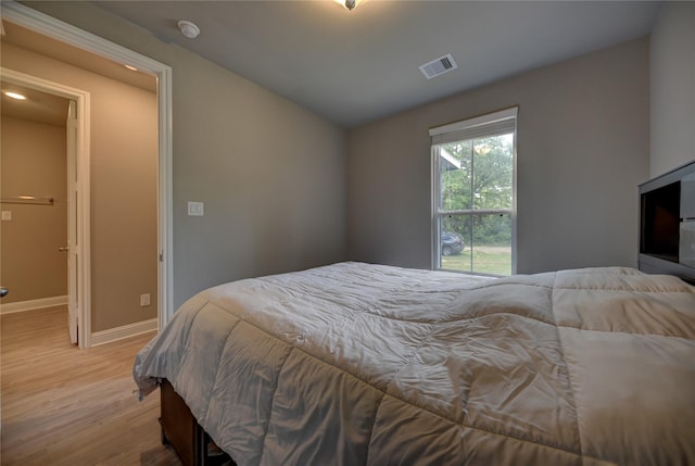 26495 Pin Oak Dr, Hempstead, TX 77445 - bedroom featuring wood finished floors, baseboards, recessed lighting, and lofted ceiling
