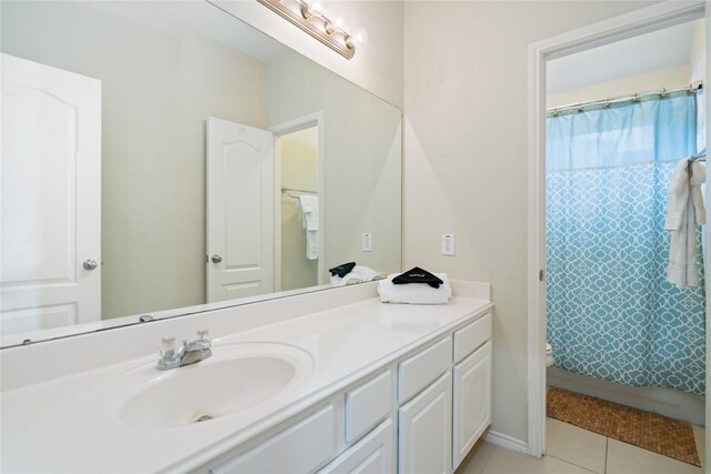 2505 Cypress Springs Ct, Pearland, TX 77584 - full bath with vanity, tile patterned flooring, curtained shower, and toilet